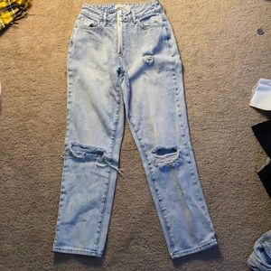 Light blue ripped jeans
